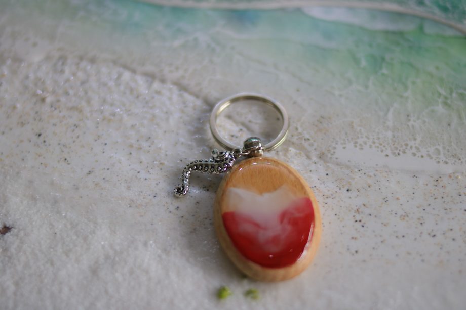 Handmade Wooden & Resin Keychain – Red & White Swirl with Seahorse Charm